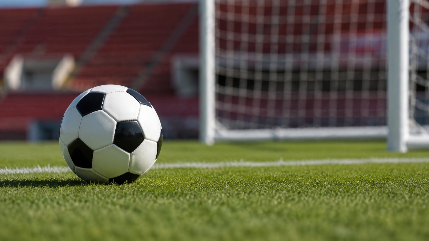 Süper Lig’i temsil eden futbol topu ve kale görüntüsü
